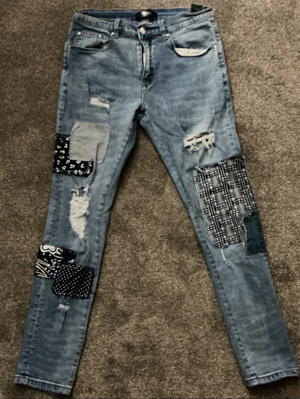 AMIRI Light Blue Distressed Patchwork Skinny Jeans